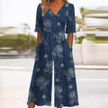 Emma | Dame Boho Blomsterprint Jumpsuit V-hals Halværmer Lommer